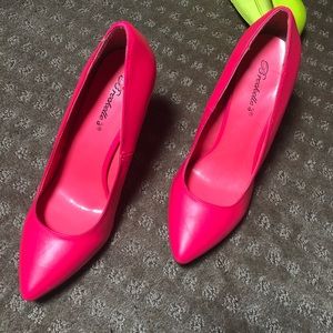 Neon high heeled Pink pumps